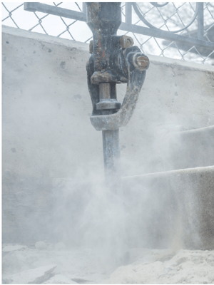 Using jackhammer to brake concrete creates dust and airborn RCS