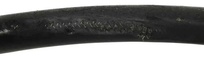 Hydraulic Hose Damaged by Abrasion